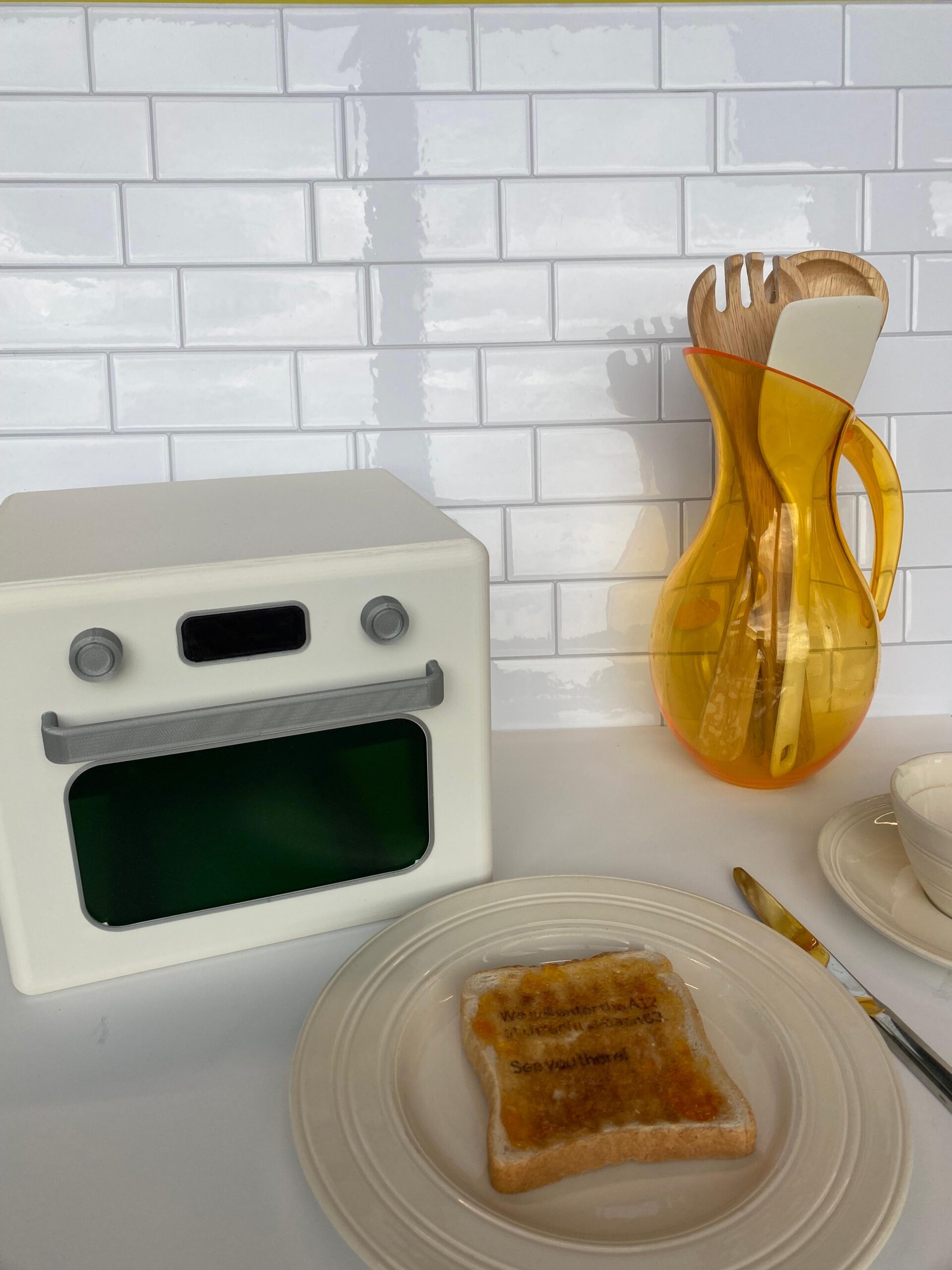 The laser-toaster prototype, using a storebought laser-engraver and 3D-printed cover (M2.1)