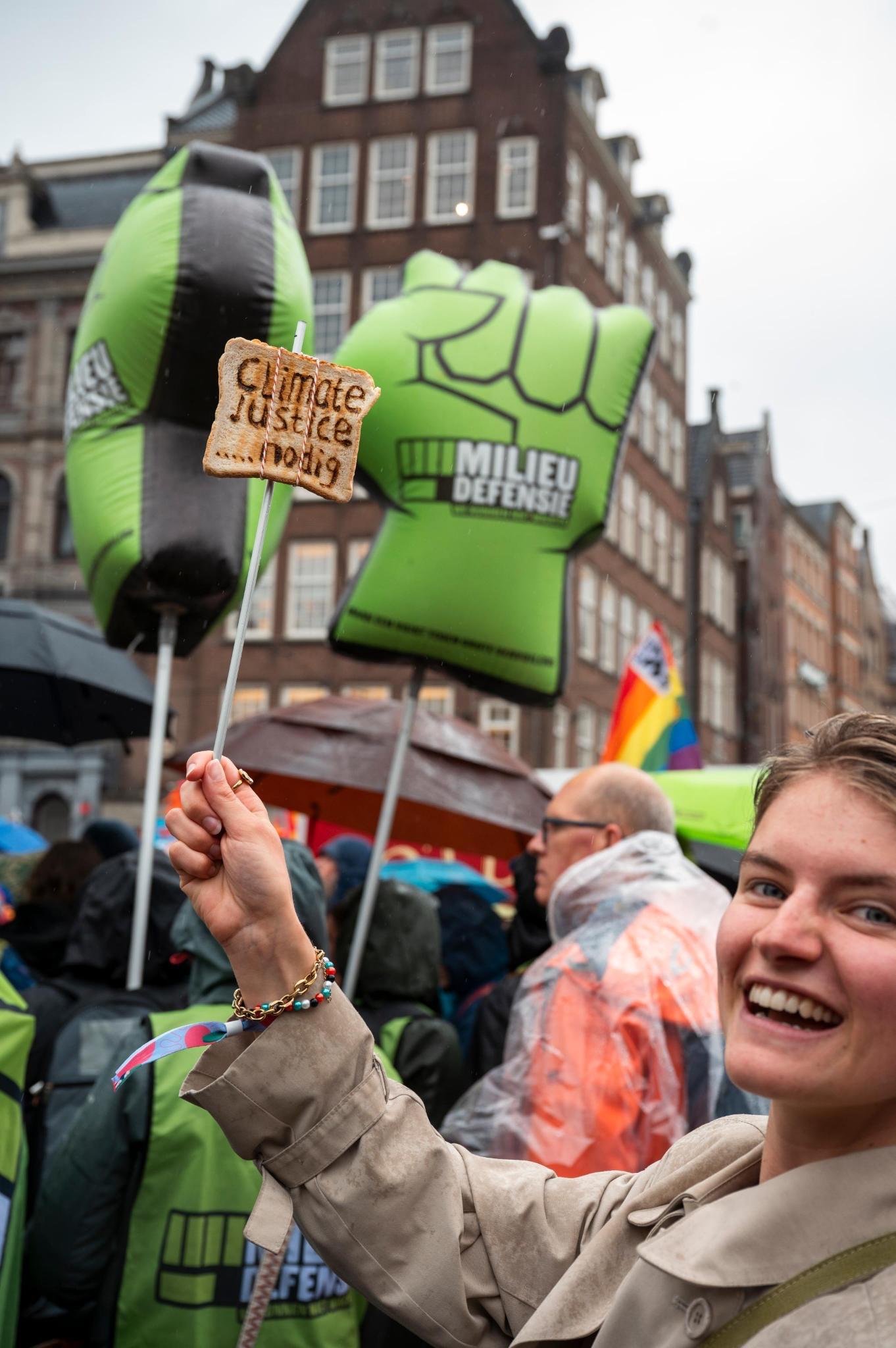 First-person experience of a protest with a toast-sign (m2.1)